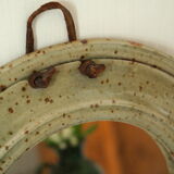 Artisanal round mirror in vintage green sandstone signed