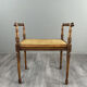 Banquette / tabouret en bois sculpté et cannage, XXe siècle