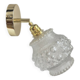 Gold wall light with bubble glass