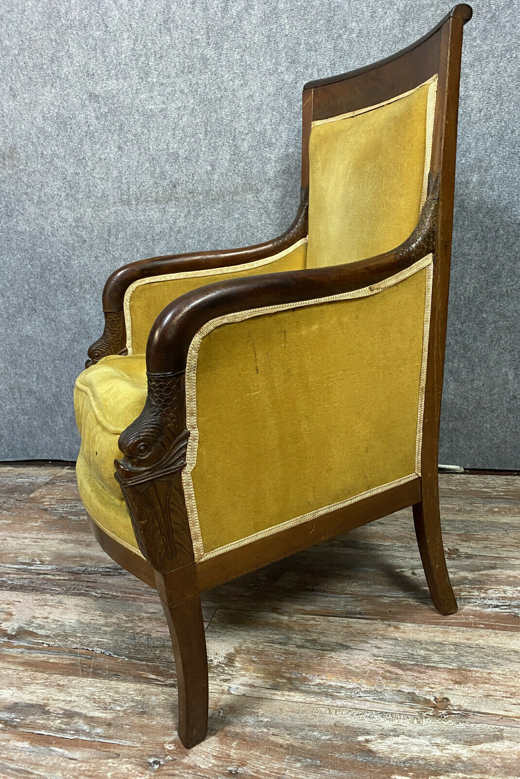 Pair of chairs Empire era to mahogany dolphins around 1810