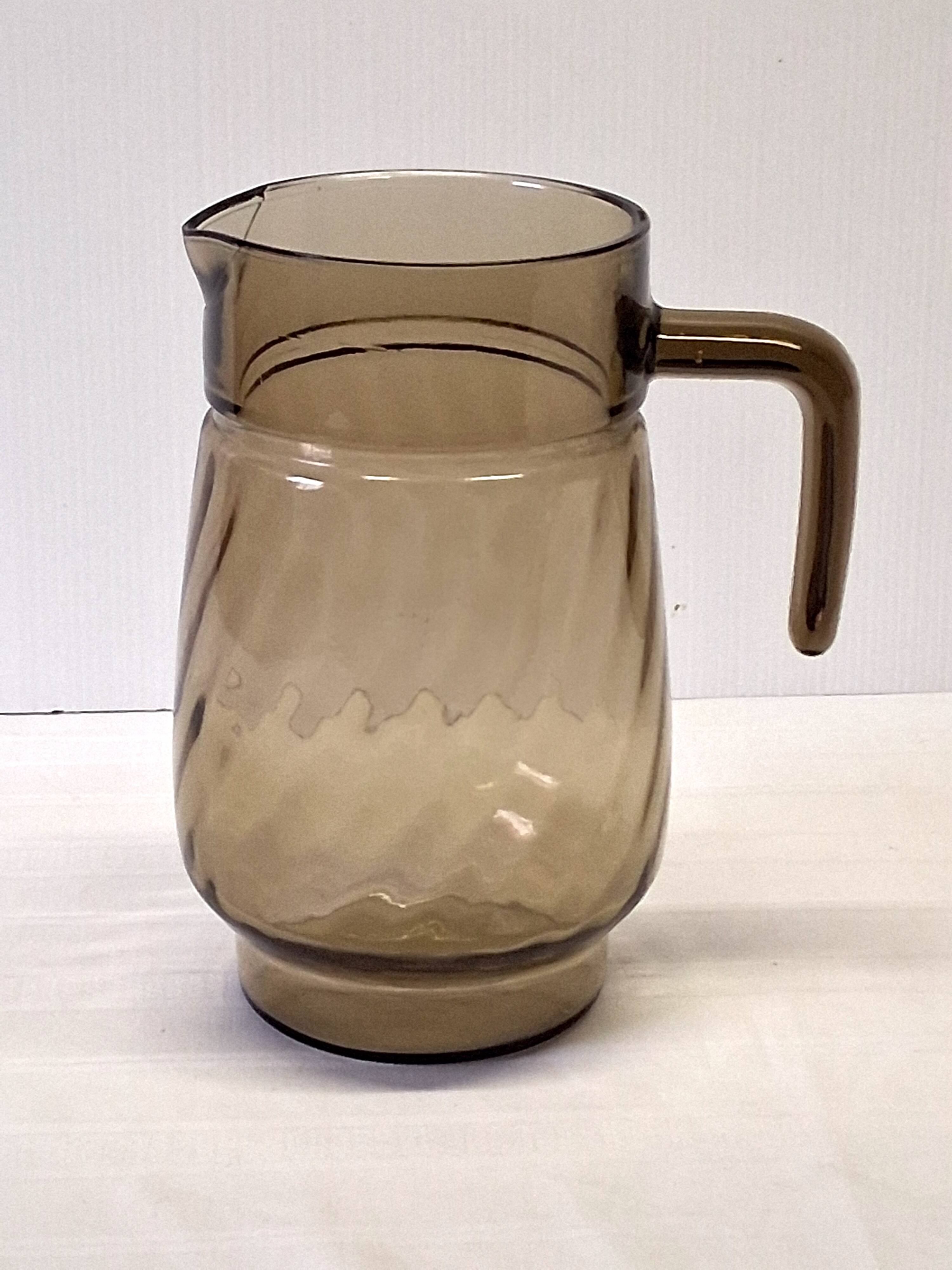 Very pretty black smoked glass pitcher from Lever in very good condition.