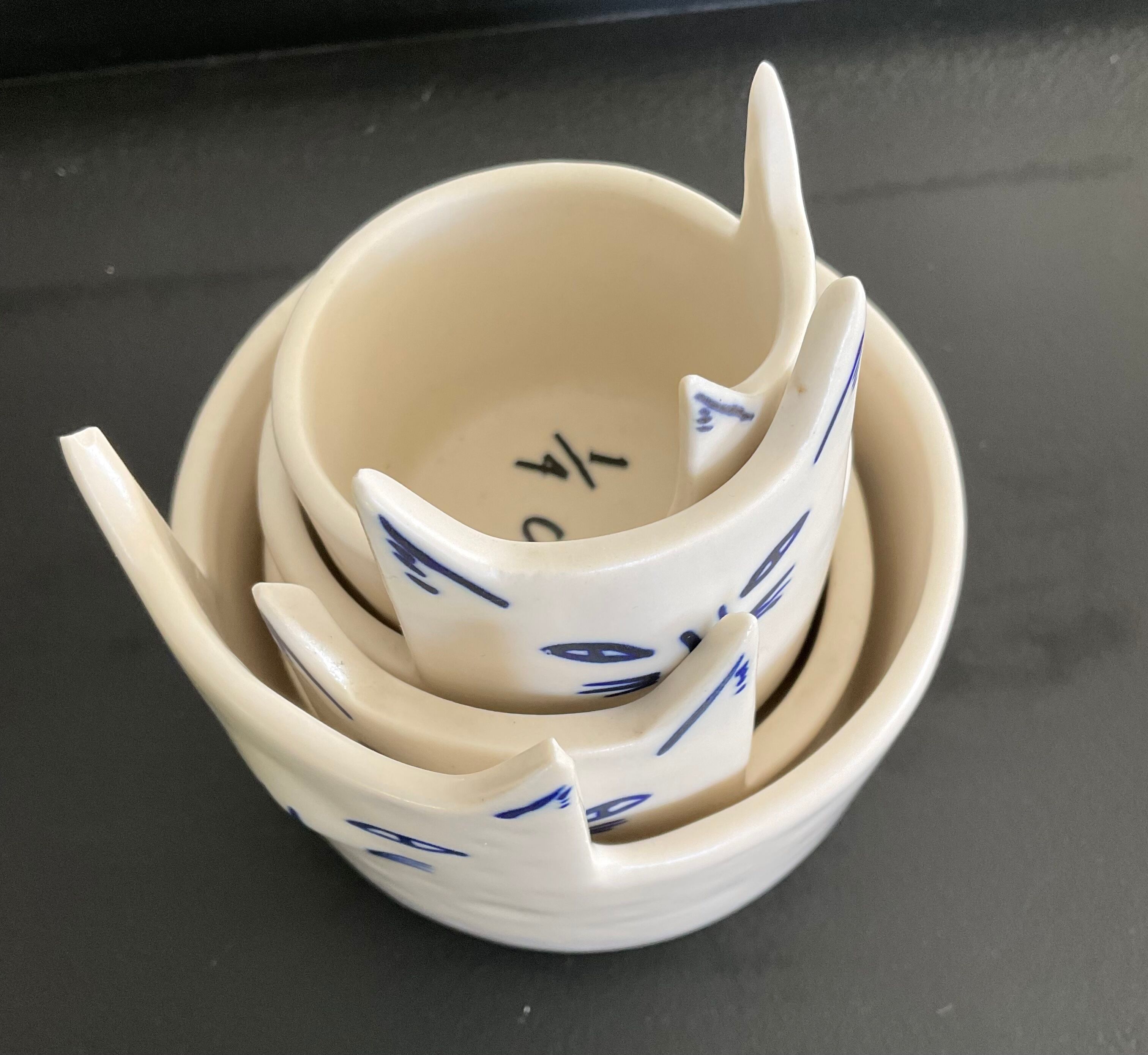 Series of 4 ceramic cat ramekins