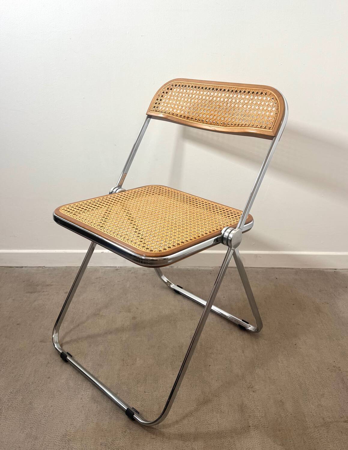 Plia folding chair by Giancarlo Piretti for Castelli – Rattan
