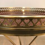 Round brass and mahogany sofa end from Jansen