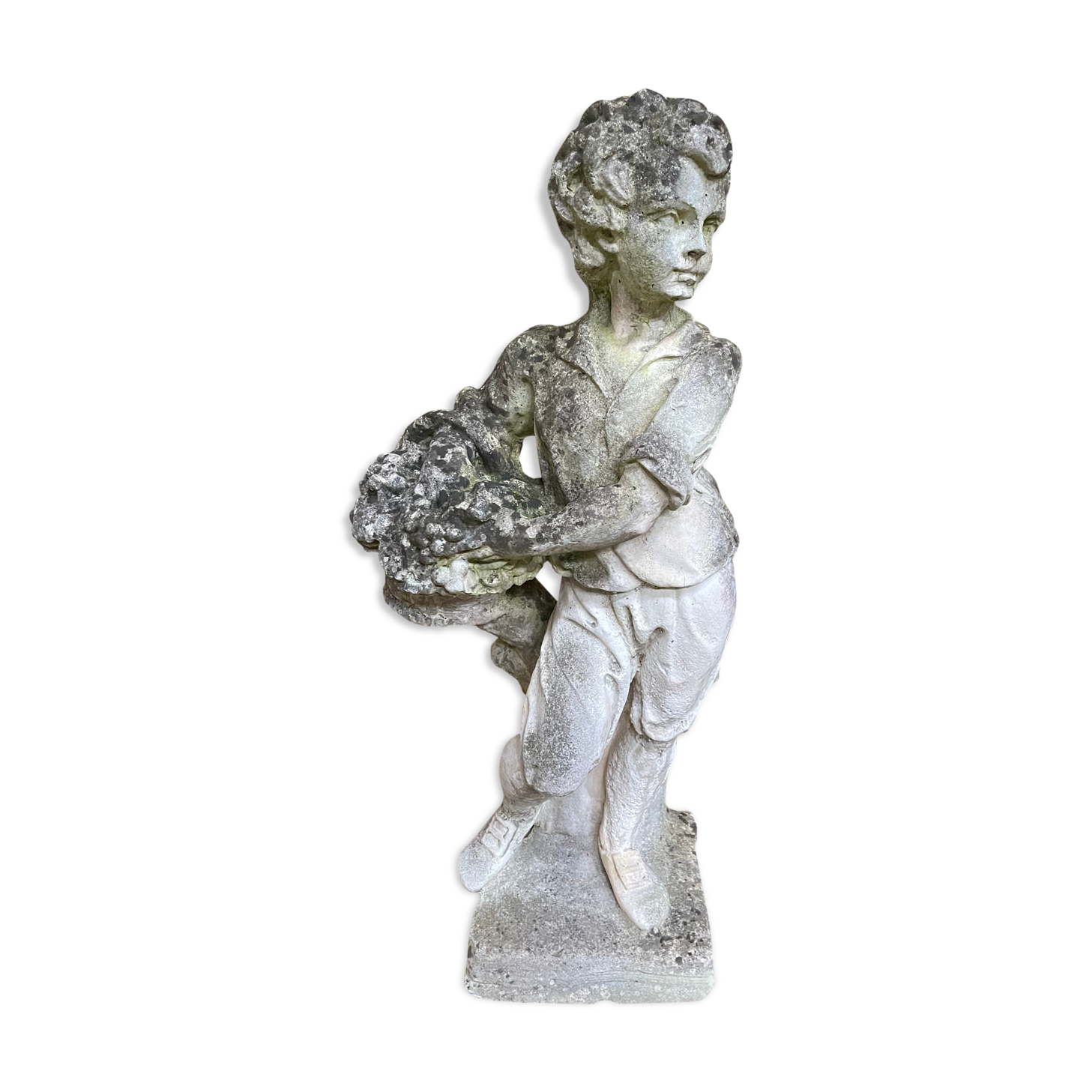 Stone garden statue to the child