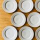 11 Assiettes à dessert en grès moucheté vintage