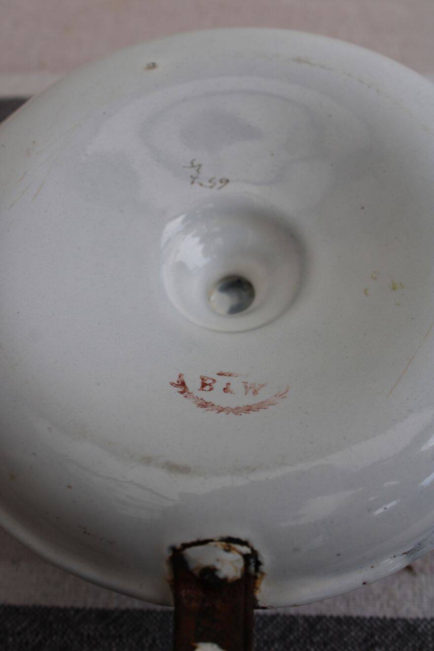 Antique enamel candle holder