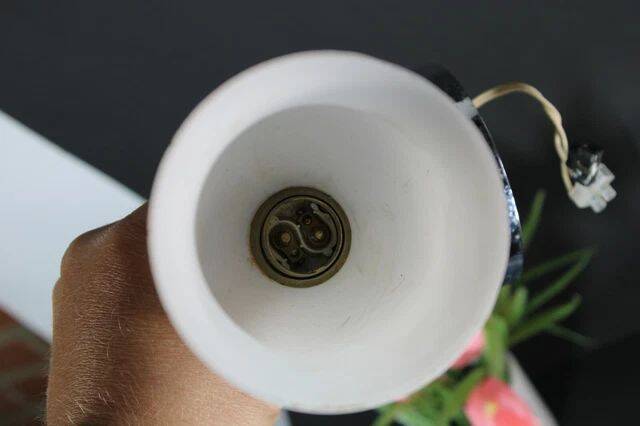 Pair of chrome-plated metal wall lights, hand-shaped with lampshade