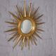 Sun mirror in gilded wood