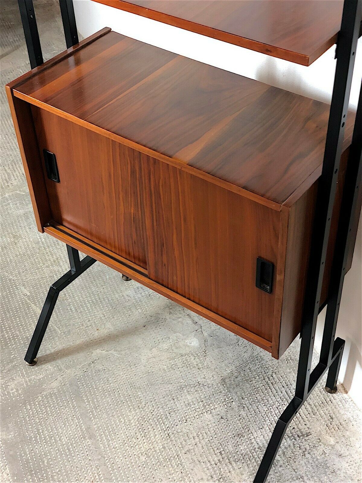 Modular storage cabinet and teak bookcase. Italy, 60s