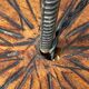 Wrought iron floor lamp with magazine holder and sisal shade, 1950s