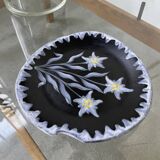 Black ceramic plate from the 60s