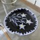 Black ceramic plate from the 60s