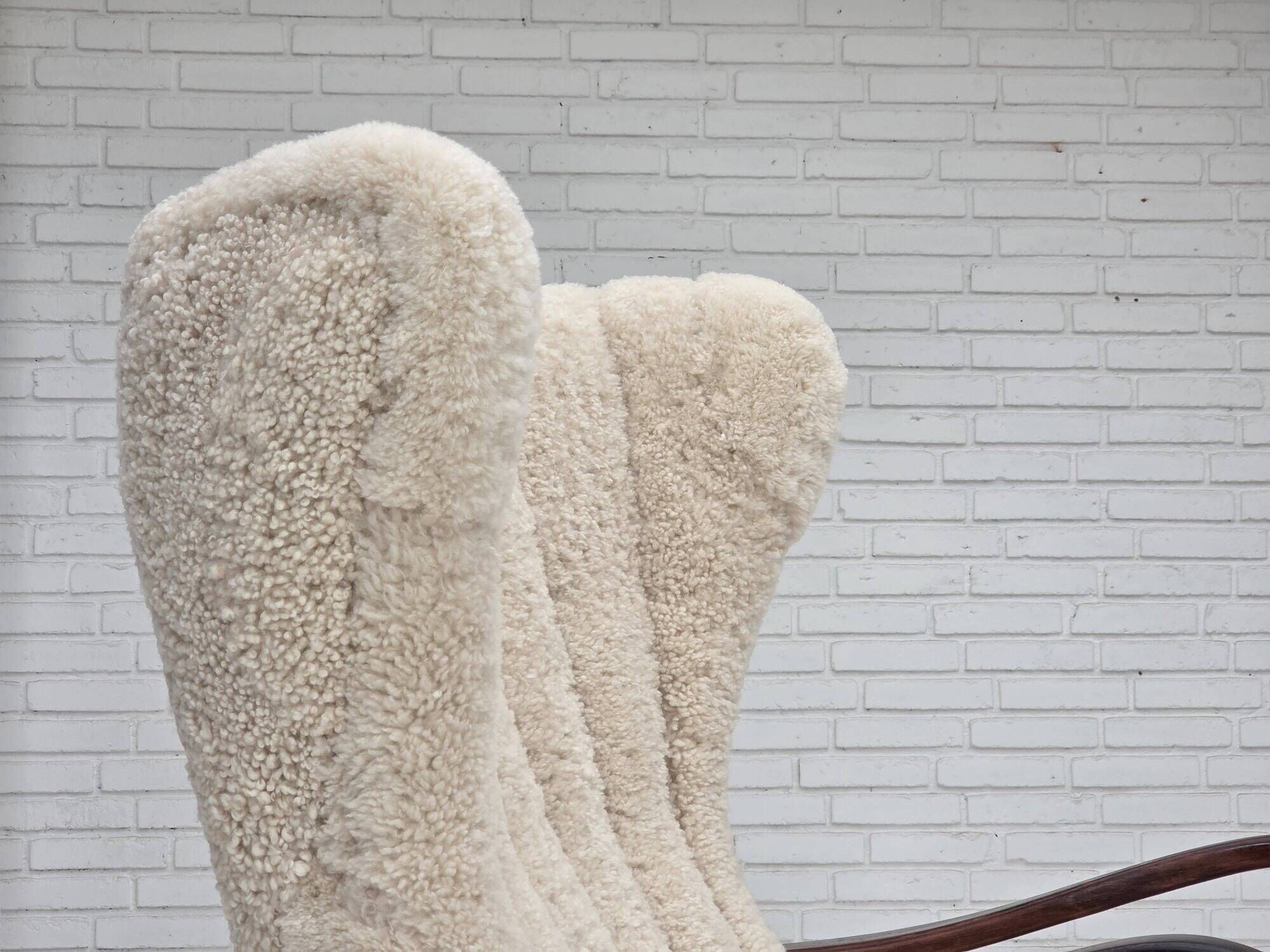 1960s, Danish high-back armchair, genuine sheepskin, reupholstered.