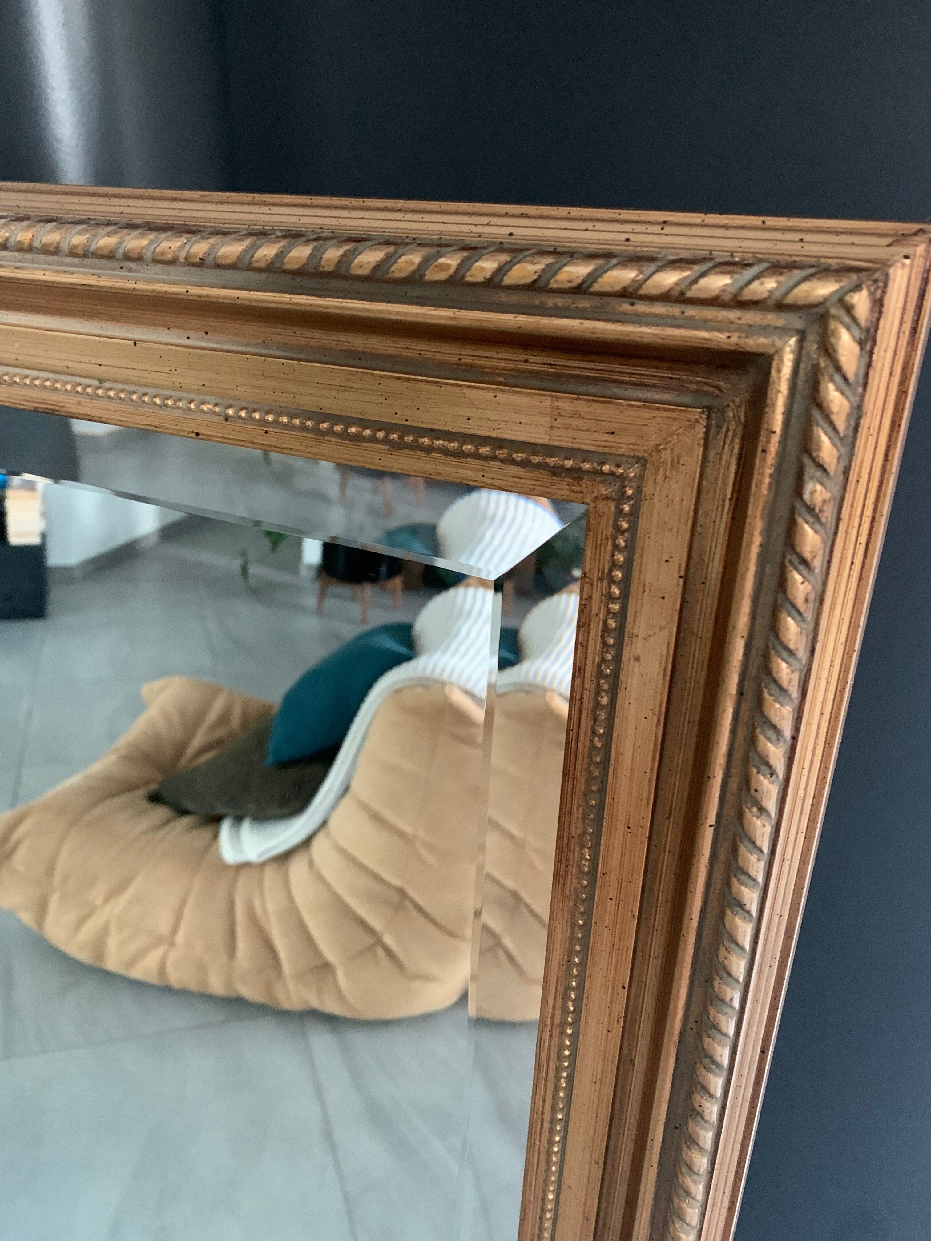 Beveled mirror gilded leaf XXth, 142x82 cm