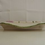 Plate of asparagus with a sauce.