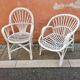 Deux fauteuils en rotin blanc
