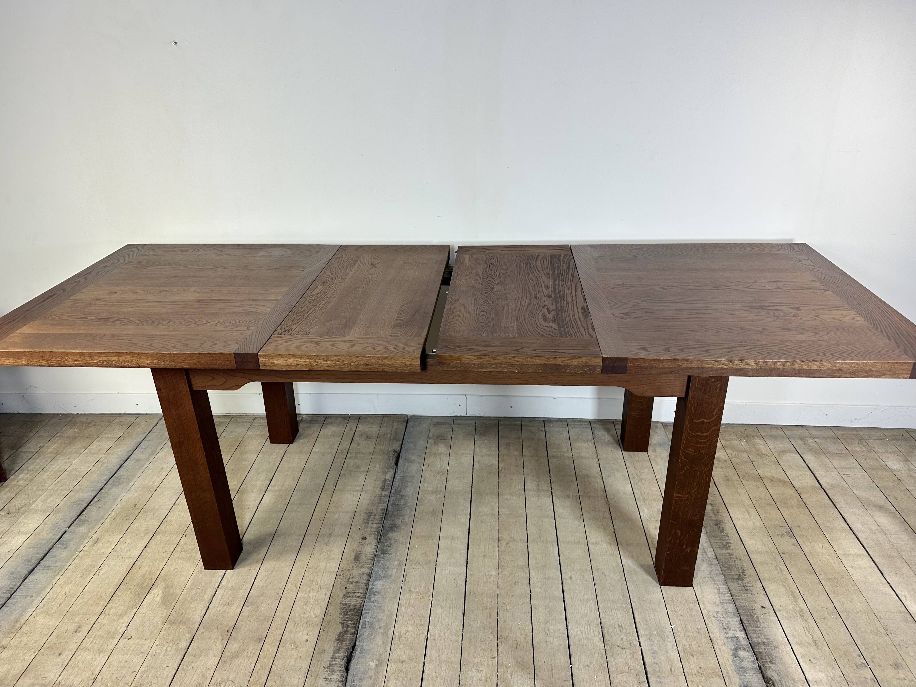 Brutalist solid oak table with 2 extensions from the 1990s.