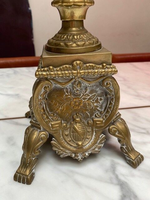 Fireplace trim clock and adornment of antique bronze candelabra