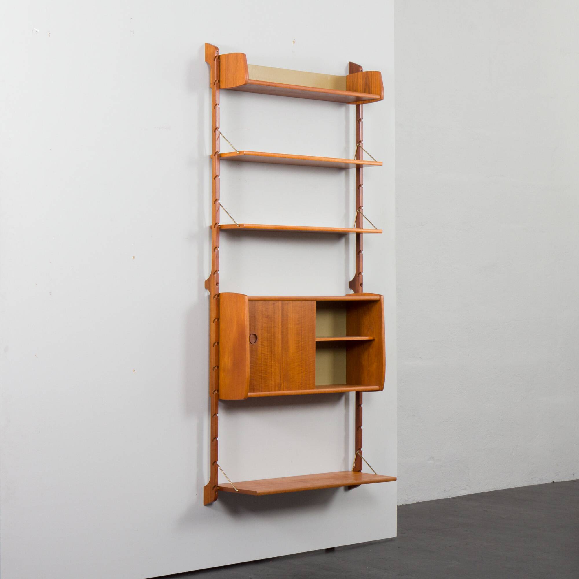 Scandinavian modern wall shelving system Ergo in teak by J. Texmon, Norway, 1960s