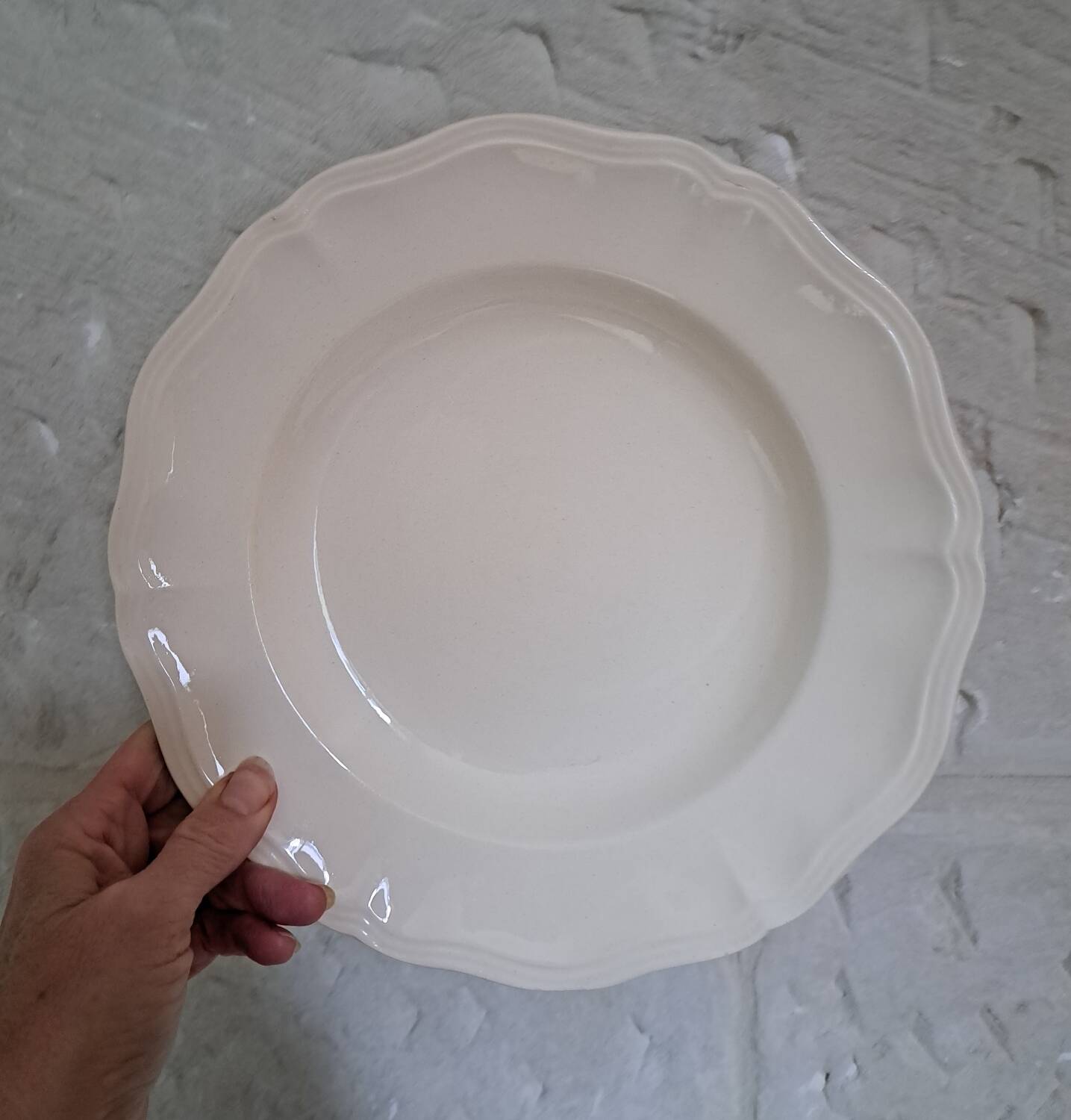Set of 9 Sarguemines ivory soup plates