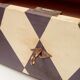 Pine chest of drawers from the 1940s with recent decorative paint.
