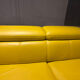 Yellow leather convertible sofa made in Italy.