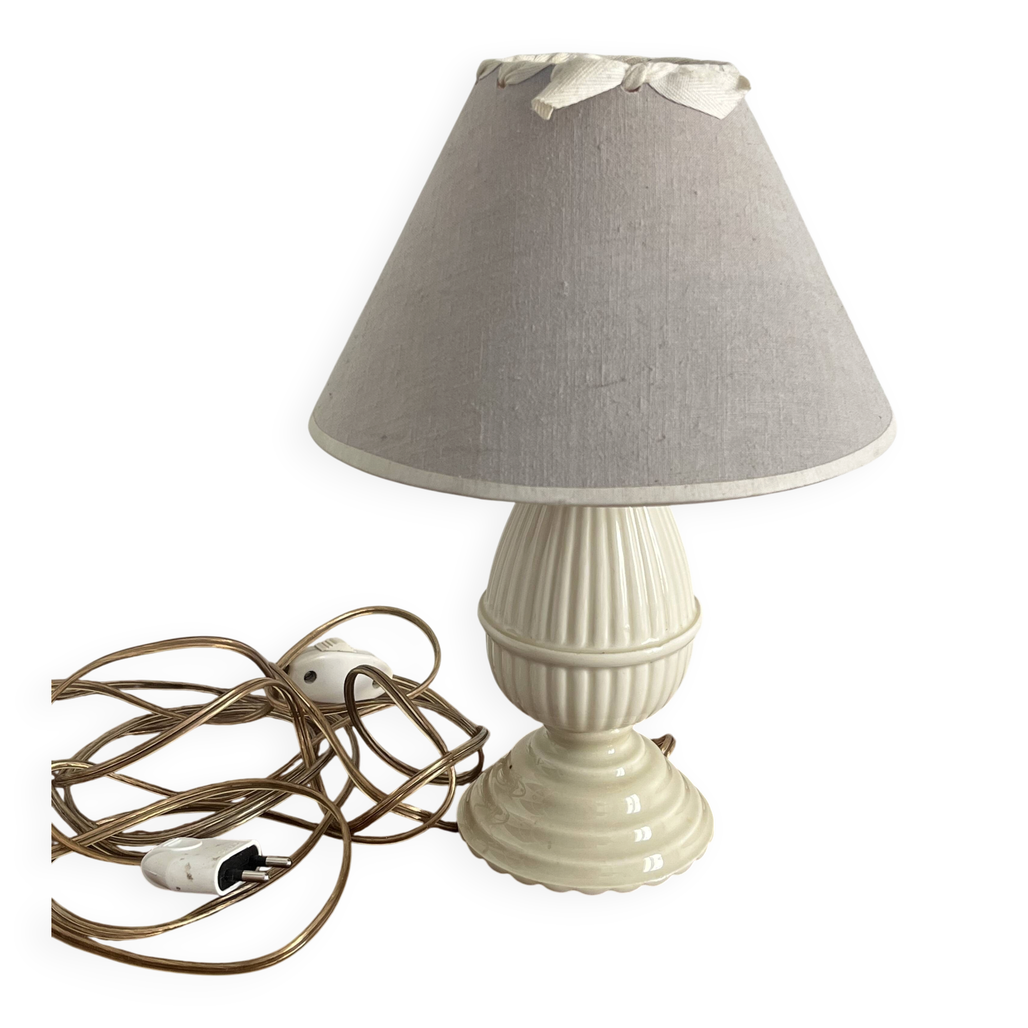 Small bedside lamp in ivory glazed ceramic.