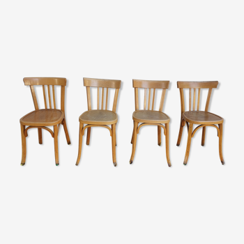 4 chaises de bistrot dont estampillée Baumann