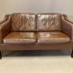 Scandinavian design 2-seater leather sofa.