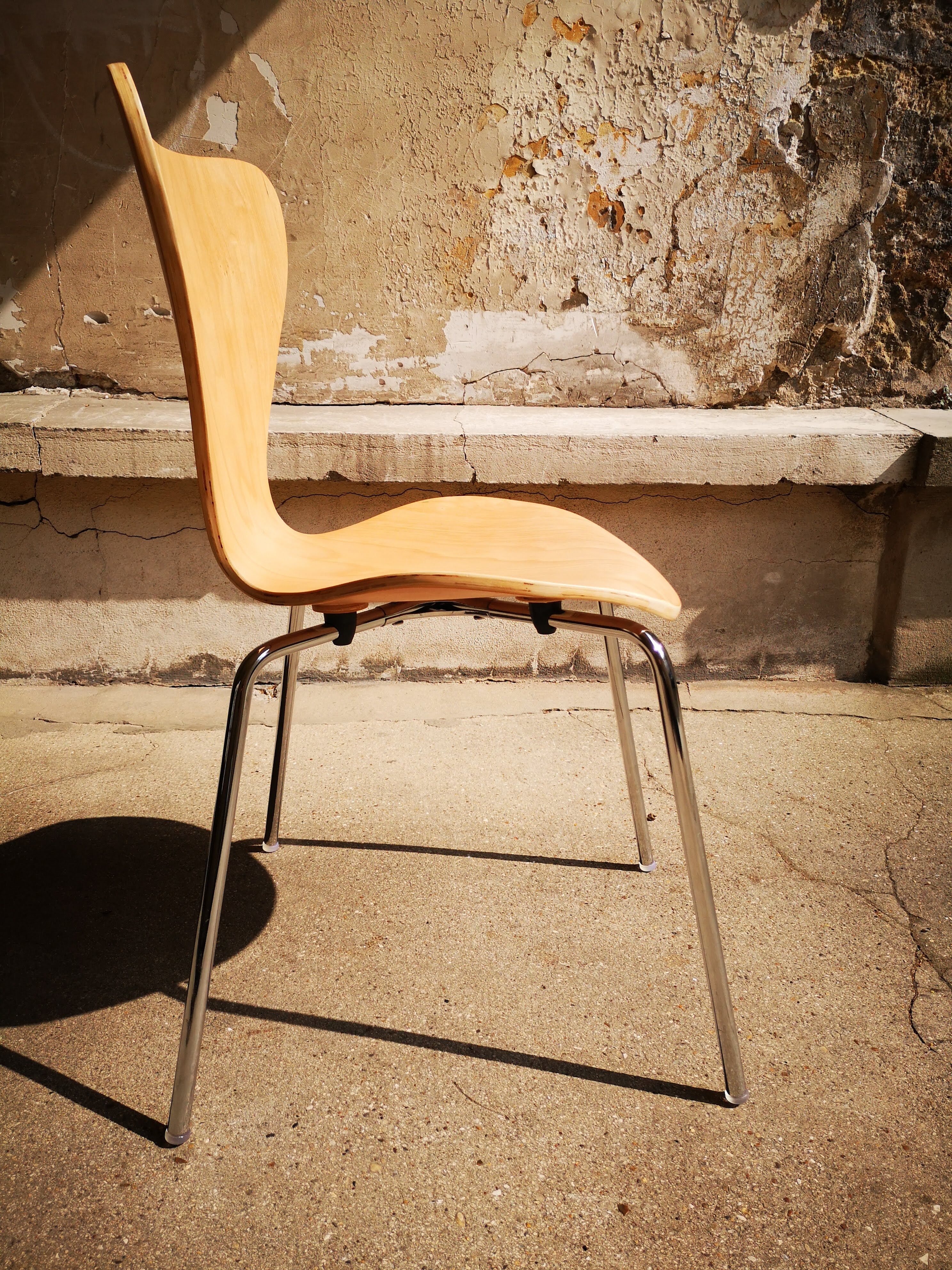 Wooden and chrome design chair