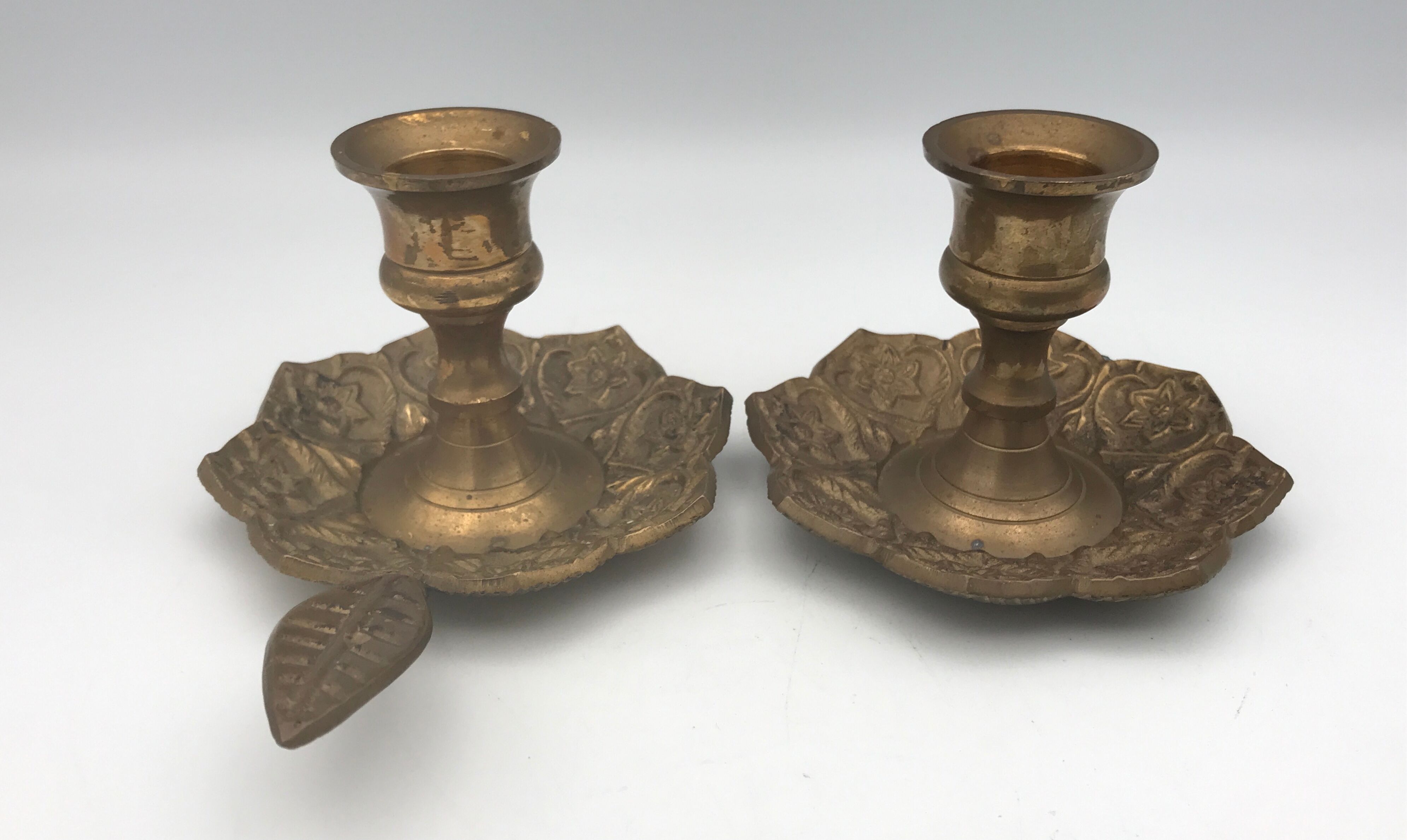 PAIR of BRASS table CANDLE HOLDERS with Flower Patterns