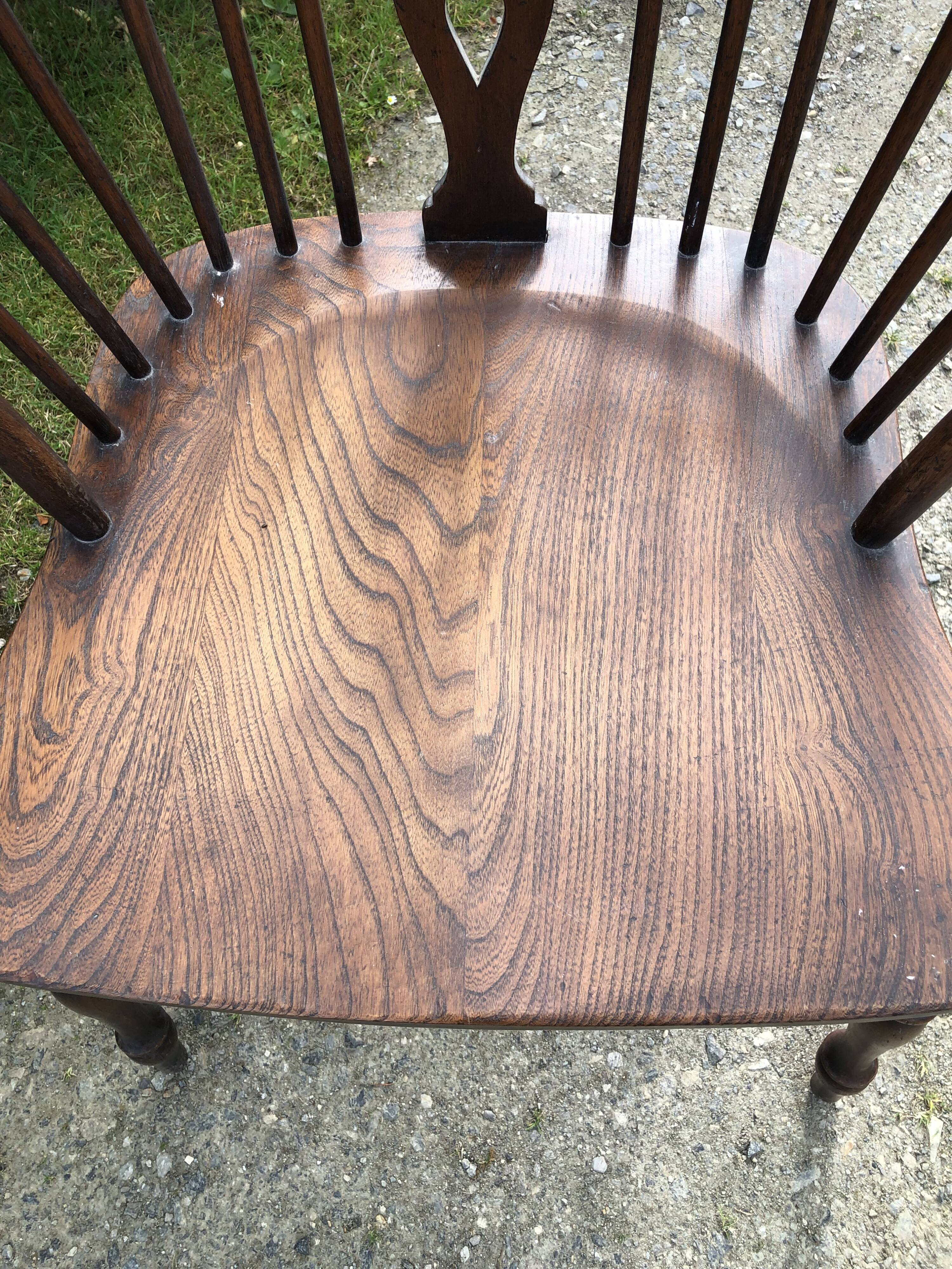 A pair of Windsor chairs in solid elm from the 1950s.