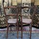 Suite of 10 bistro chairs in cannage