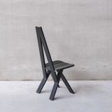 Set of six black dining chairs