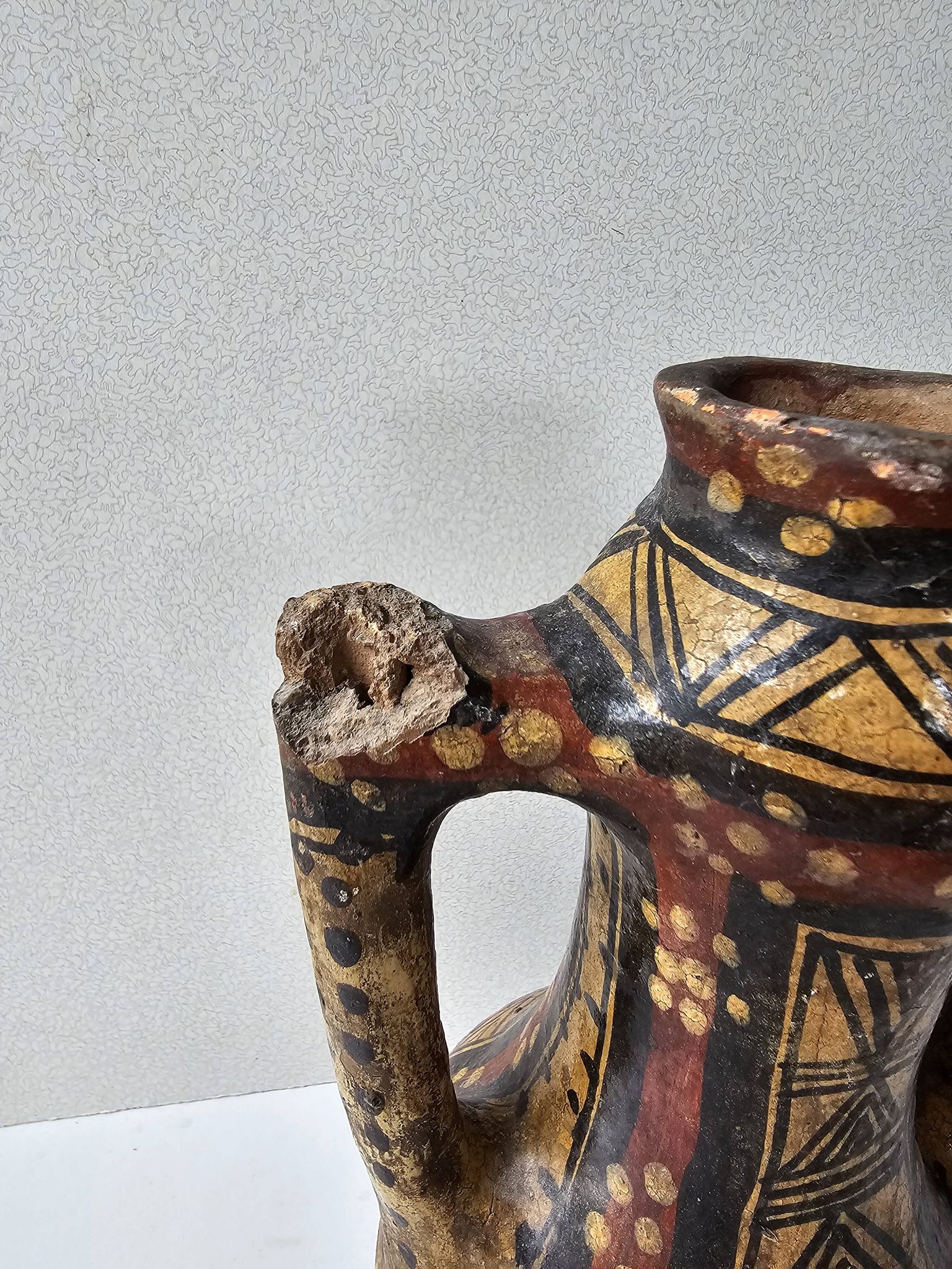 Kabyle Algerian pottery oil jar with polychrome geometric decorations