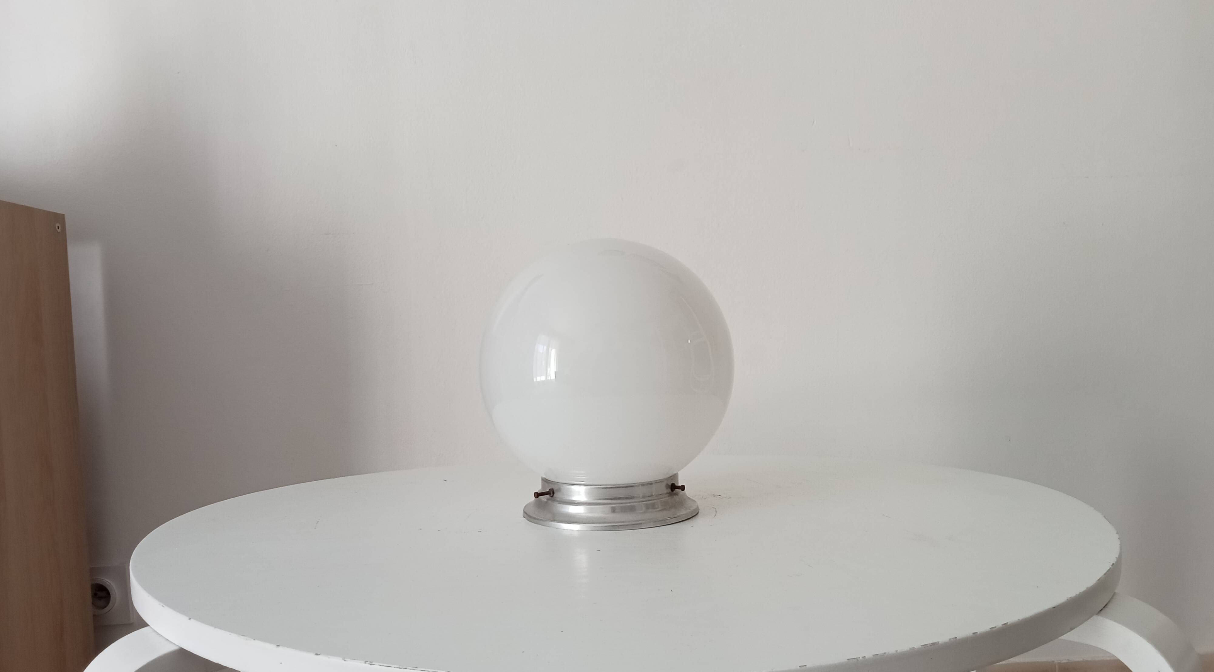 Vintage opaline and aluminium ceiling light from the 1950s.