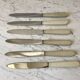 set of 6 white bakelite knives from the 60s