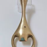 Modernist solid brass bottle opener by Carl Auböck
