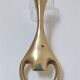 Modernist solid brass bottle opener by Carl Auböck