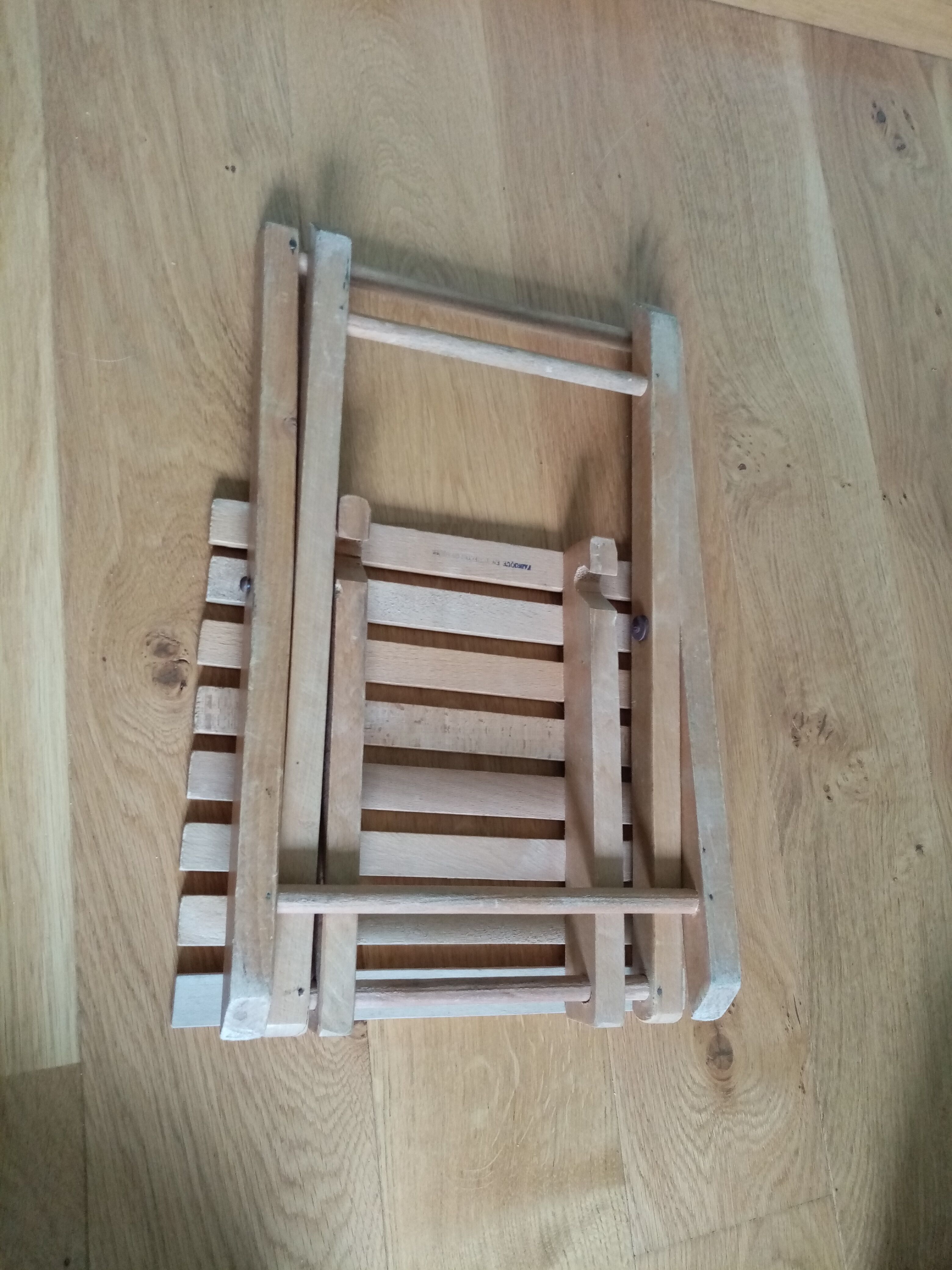 Tabouret pliant porte-plante en bois