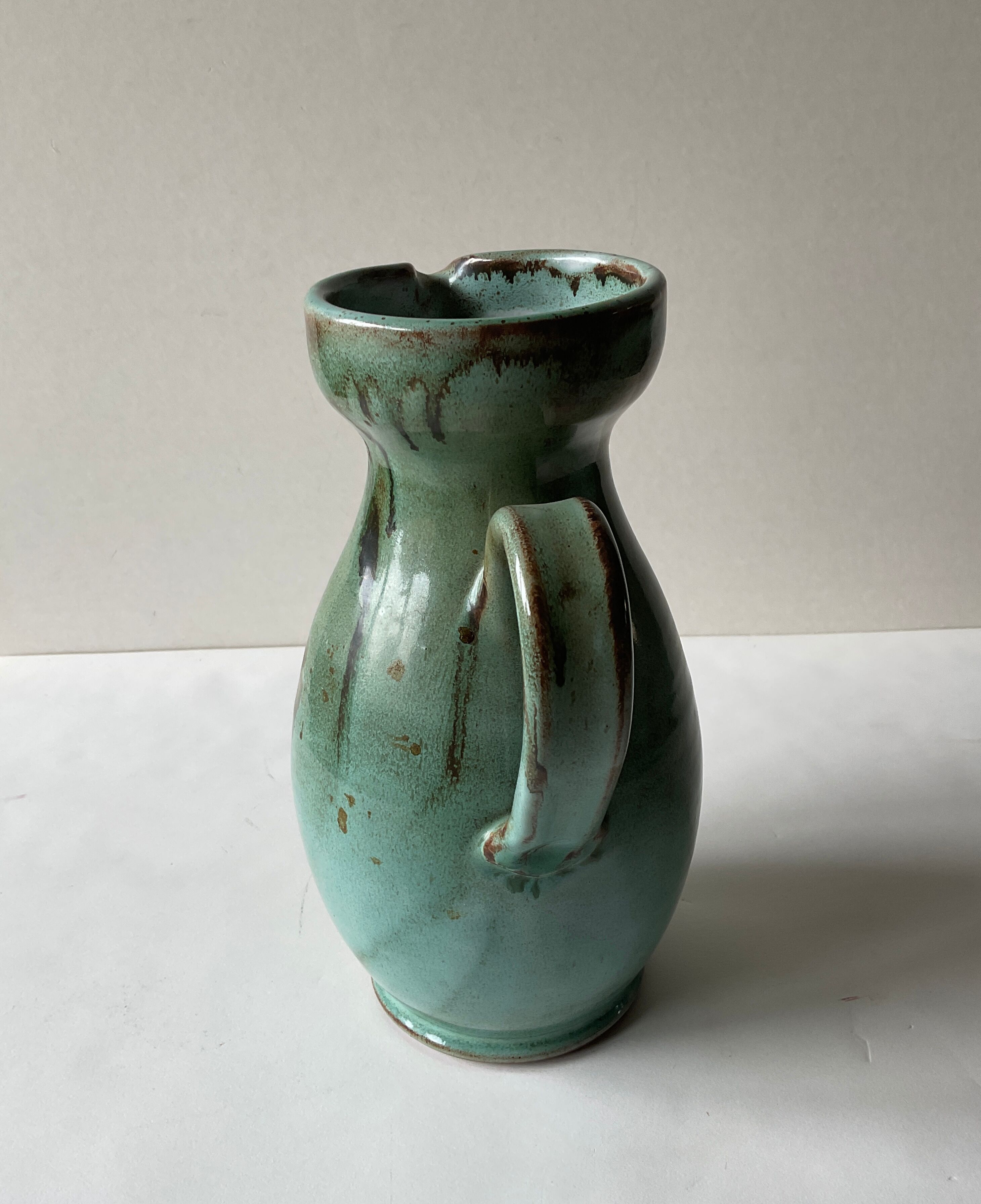 Vintage celadon ceramic pitcher