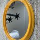 Vintage oval mirror from the 1970s.