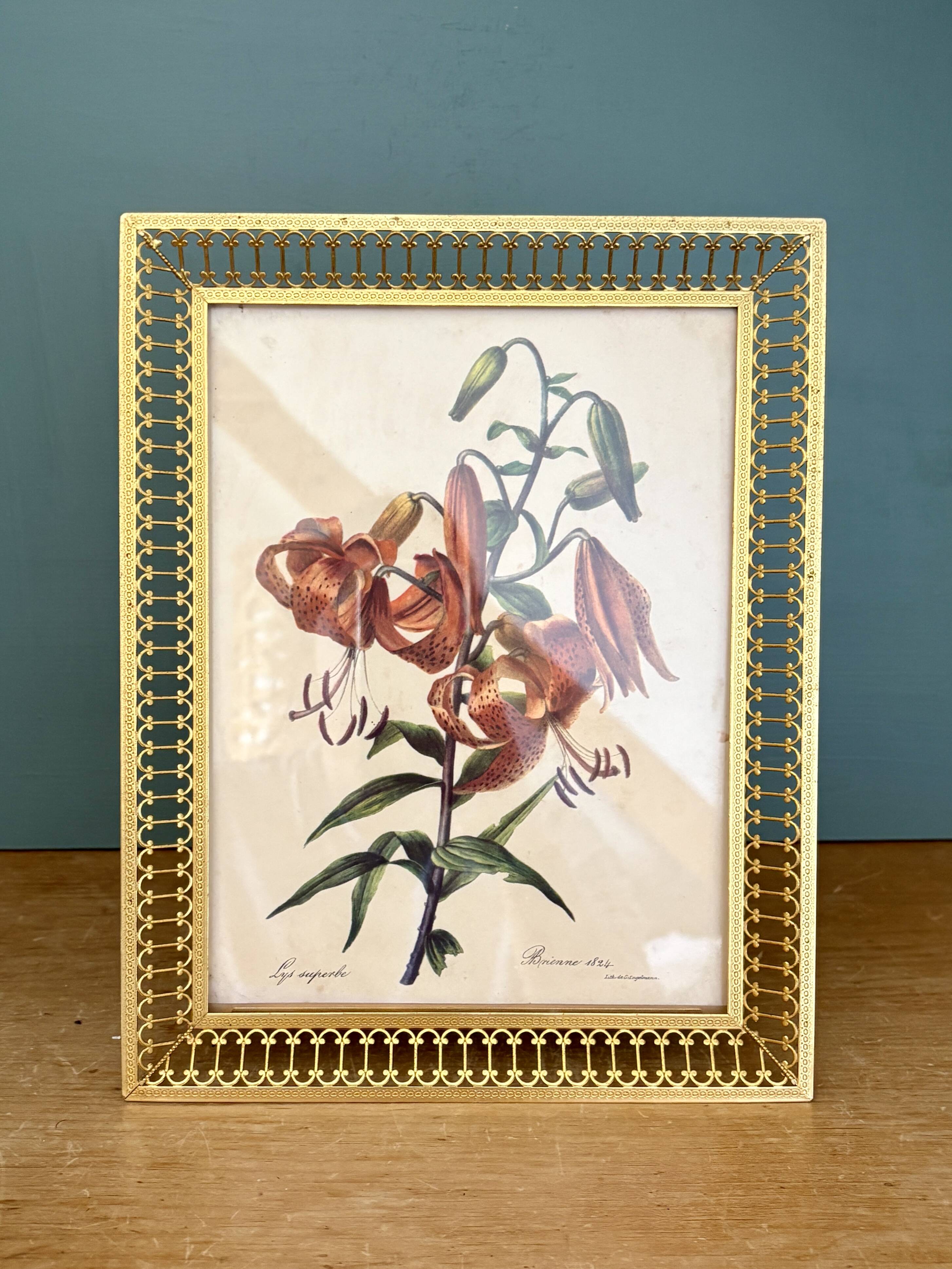 Antique gilt metal frame with flower engraving