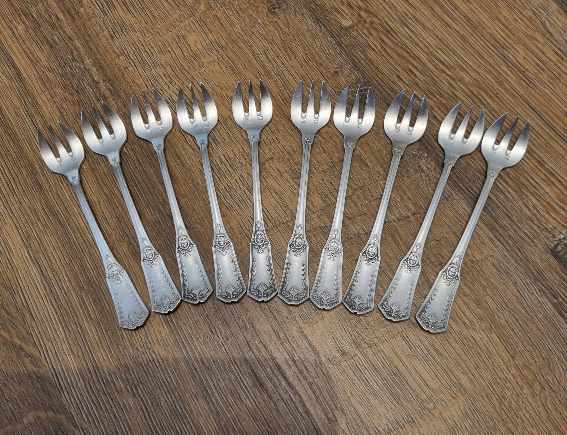 10 fourchettes à huîtres argent début XXéme
