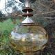 Vintage suspension ball in amber glass