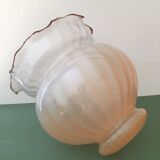 Globe with transparent peach colored glass rims