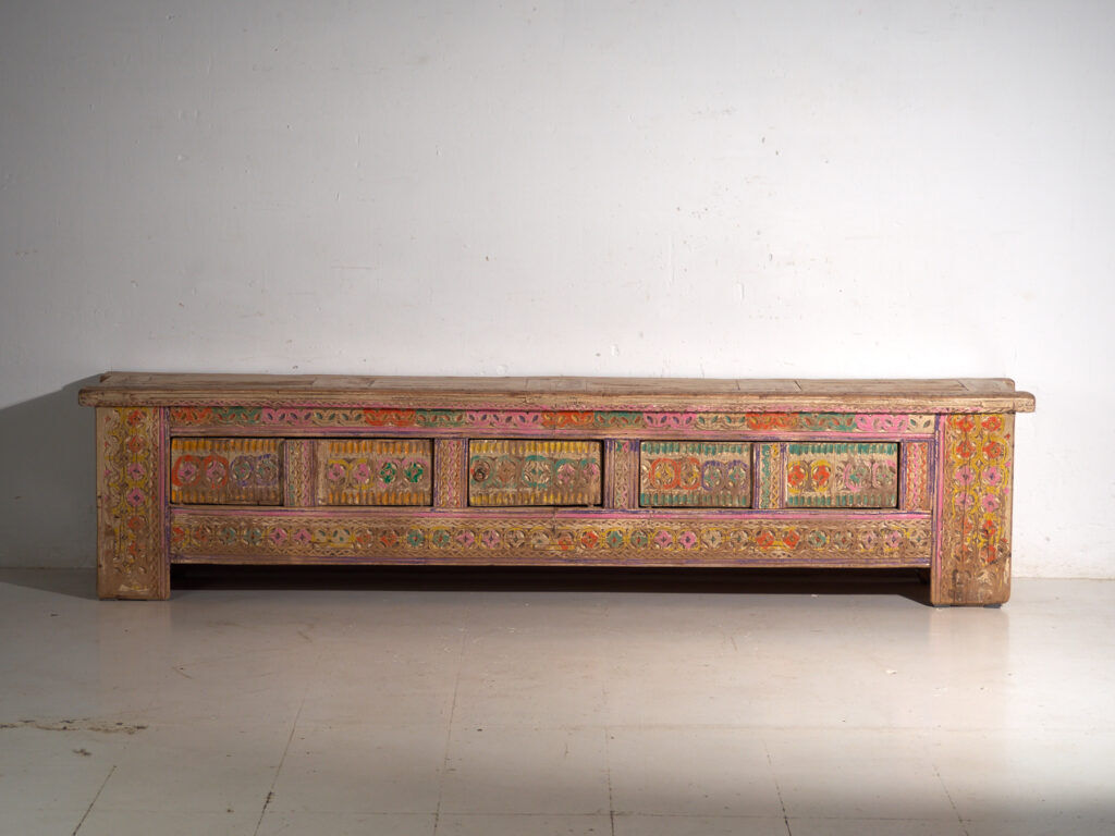 Antique carved low cabinet with drawers in pine – Xinjiang, circa 1900