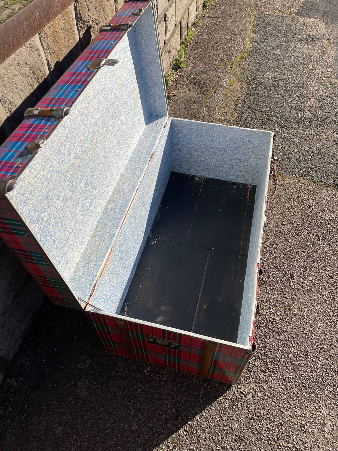 Old wooden and metal travel trunk