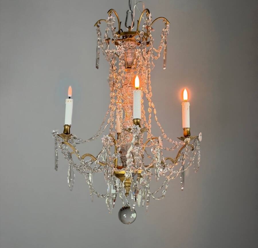Bronze chandelier with cut crystal pendants, circa 1800.